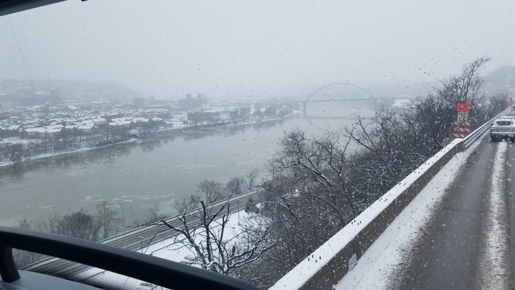 winter scene of river and bridge